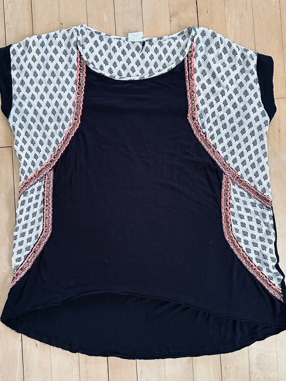 Women's black Tunic Tee with Printed Cream Panels and Coral Trim
